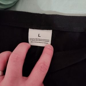 Black leggings size large with defect